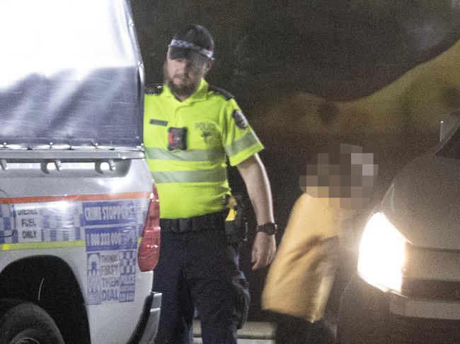 ## Please Note Faces are Blurred ##  20/01/2023: A young Indigenous Australian is released from a police cage truck and enters a local youth organisation vehicle to be returned to a ÃŒ?town campÃŒ? in Alice Springs. Picture: Liam Mendes / The Australian