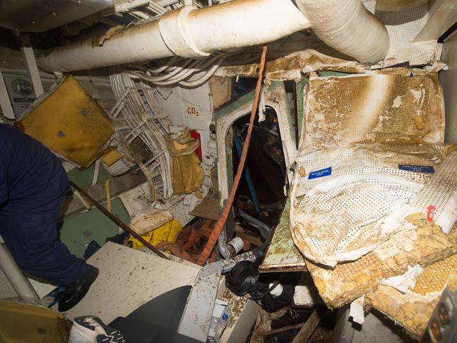 Loose debris fill the remans of Berthing 2. Picture: USN