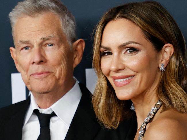 US singer Katharine McPhee and husband Canadian producer David Foster attend the 2024 MusiCares Person of the Year gala at the LA Convention Center in Los Angeles, February 2, 2024. (Photo by Michael TRAN / AFP)