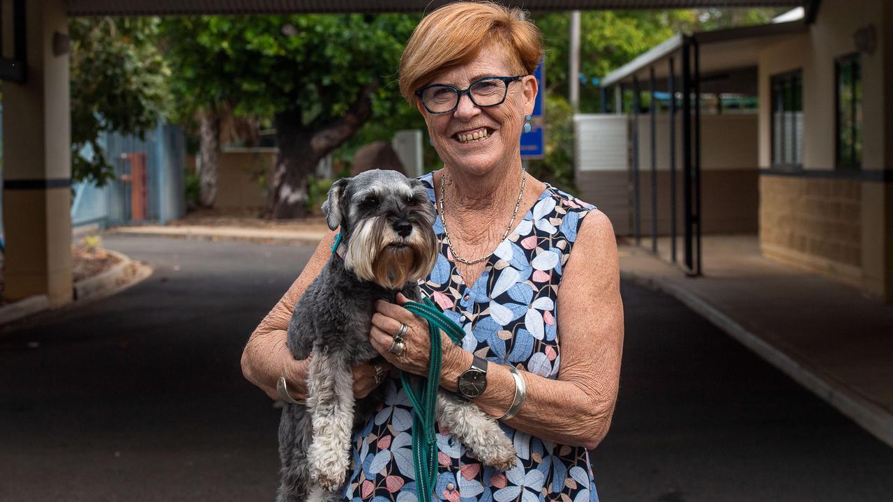 Parap Primary School principal Yvonne Harding brings miniature schnauzer Wesley to school once a week to engage with her students. Picture: Pema Tamang Pakhrin