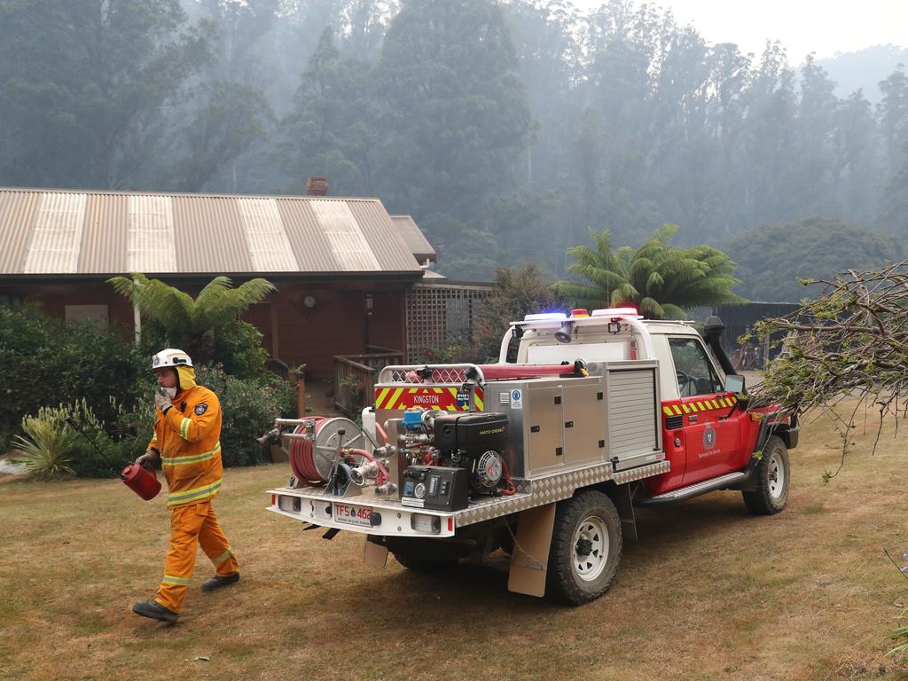 January 2019 Tasmanian Bushfires. Dylan Murphy from Kingston Fire Brigade helping to put in a controlled fire break behind a home on Donnellys Rd, Geeveston, in the Huon Valley. Picture: NIKKI DAVIS-JONES