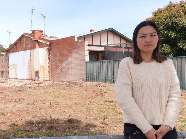 Demolition Yali Wu says that unauthorised demolition of a neighbouring property damaged her Park Holmes house. Picture: Renato Castello