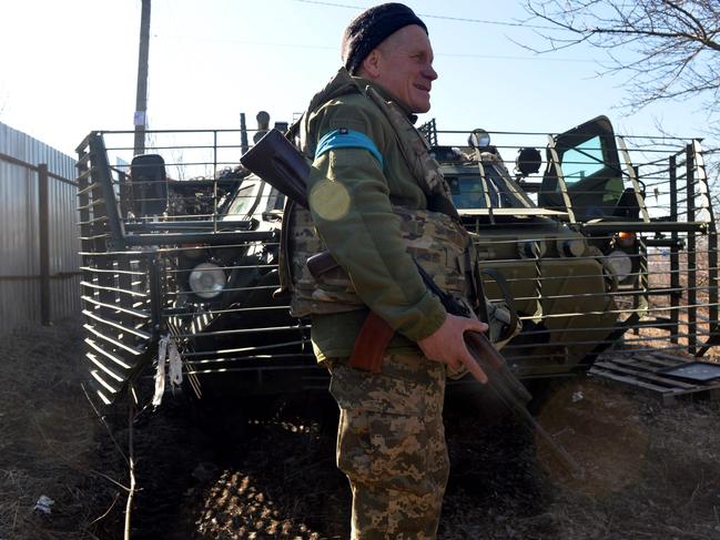 A Ukrainian military force serviceman at a checkpoint near Kharkiv. Picture: AFP