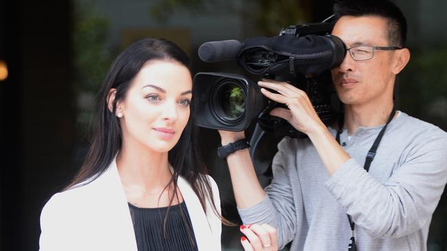 Channel Seven reporter Laura Banks leaves the hearing against former Auburn deputy mayor Salim Merhajer today. Picture: Jeremy Piper