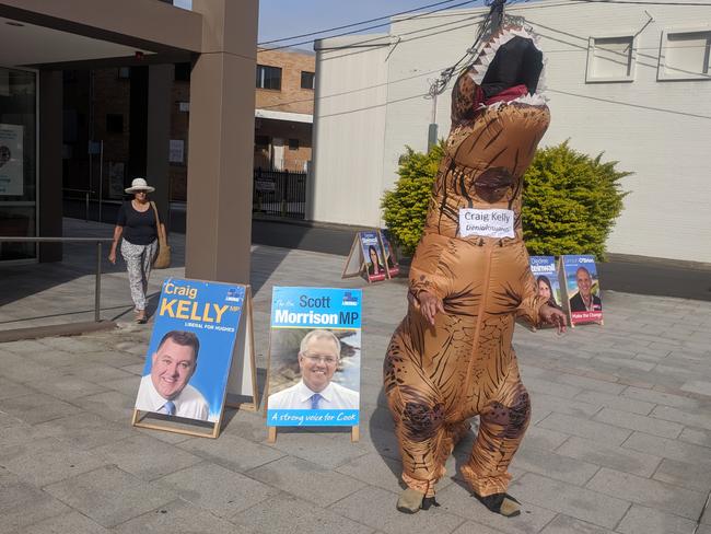 Police are investigating allegations of an altercation between the man dressed in the dinosaur and Craig Kelly.