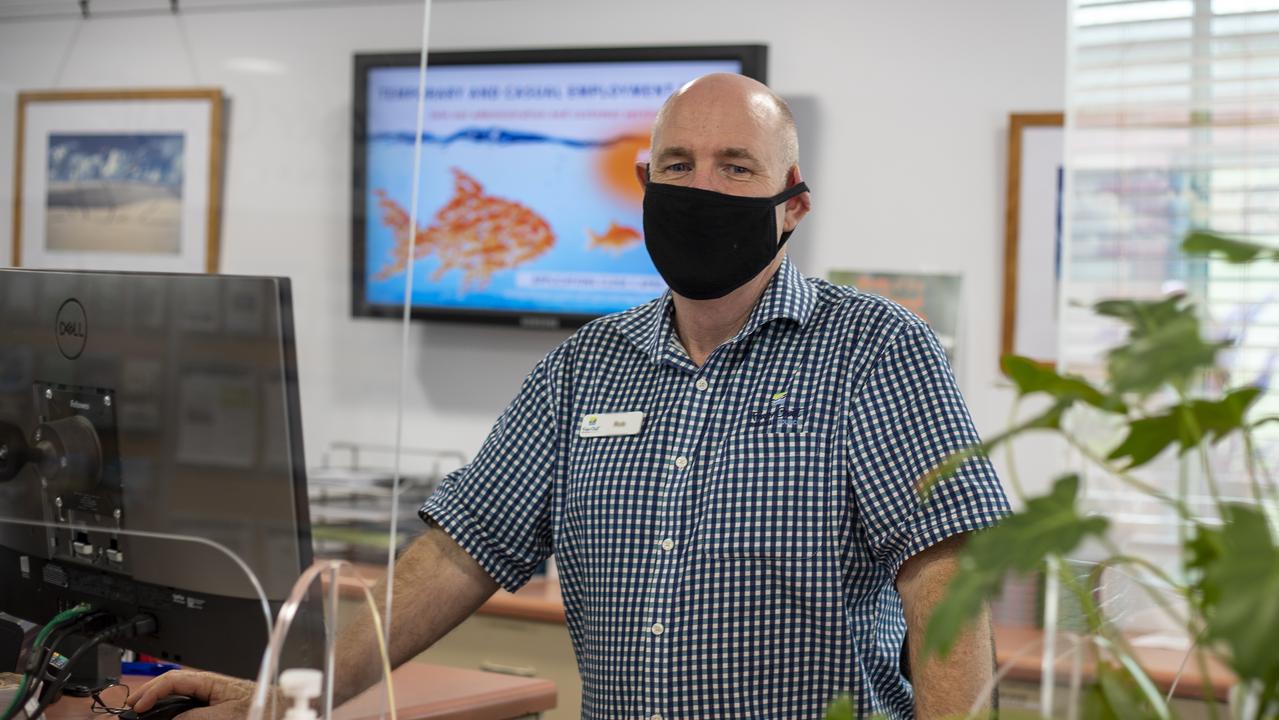 A Fraser Coast Regional Council Service Officer masks up at the council office in Hervey Bay. Photo: Contributed