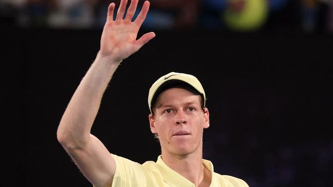 Italy's Jannik Sinner celebrates his victory against Germany's Alexander Zverev during their men's singles final match on day fifteen of the Australian Open tennis tournament in Melbourne on January 26, 2025. (Photo by DAVID GRAY / AFP) / -- IMAGE RESTRICTED TO EDITORIAL USE - STRICTLY NO COMMERCIAL USE --