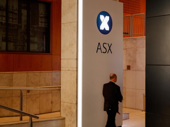 SYDNEY, AUSTRALIA - NewsWire Photos, October 29 2024. GENERIC. Stocks. Finance. Economy. A security guard in the lobby of the ASX Australian Stock Exchange on Bridge Street. Picture: NewsWire / Max Mason-Hubers