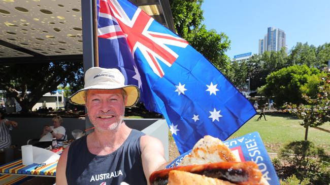 Gold Coast celebrates Australia Day at Broadwater parklands at Southport. Garry Selby from Paradise Waters with the obligatory snag.. . Picture Glenn Hampson