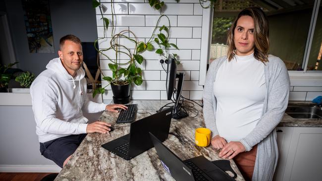 Teachers Pieter Oosterloo and wife Victoria, right, have copped rising bills due to COVID-19 lockdown in Victoria. Picture: Jake Nowakowski