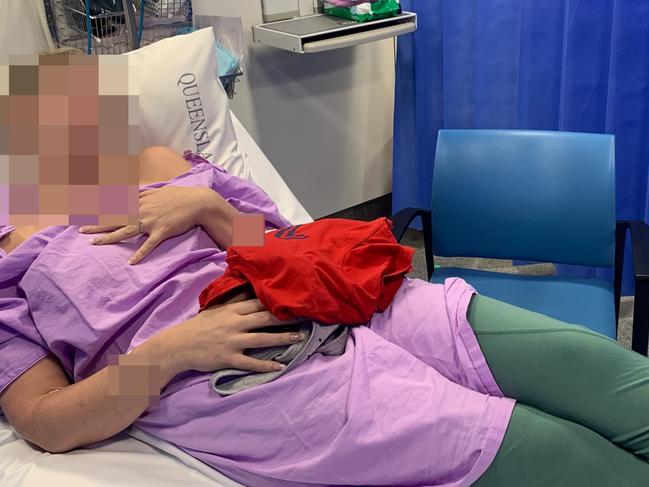 Danielle, of Hervey Bay, spent a week in hospital in February after a host of problems linked to her breast implants developed. Picture: Supplied via NCA NewsWire