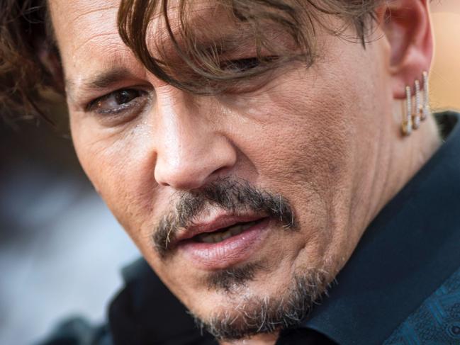 Actor Johnny Depp arrives for the world premiere of Disney movie "Pirates of the Caribbean: Dead Men Tell No Tales" in Shanghai on May 11, 2017. / AFP PHOTO / Johannes EISELE