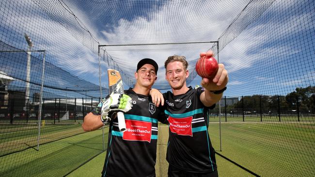 Boyd Woodcock and Kane Farrell at Adelaide Oval on Tuesday. Picture: AAP/Kelly Barnes