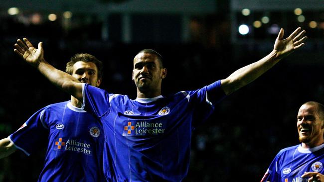 Patrick Kisnorbo (C) of Leicester City celebrates a goal in 2006.