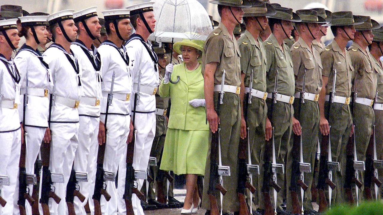 <b>2000 – Sydney </b>The Queen braves the rain to inspect the troops on the forecourt of Sydney Opera House on her 13th visit to Australia, which came just four months after the country voted against becoming a republic in the 1999 referendum. In a speech, the Queen pledged to serve as monarch as long as she was wanted. “I shall continue faithfully to serve as Queen of Australia under the constitution to the very best of my ability, as I have tried to do for these past 48 years. That is my duty. It is also my privilege and my pleasure.”