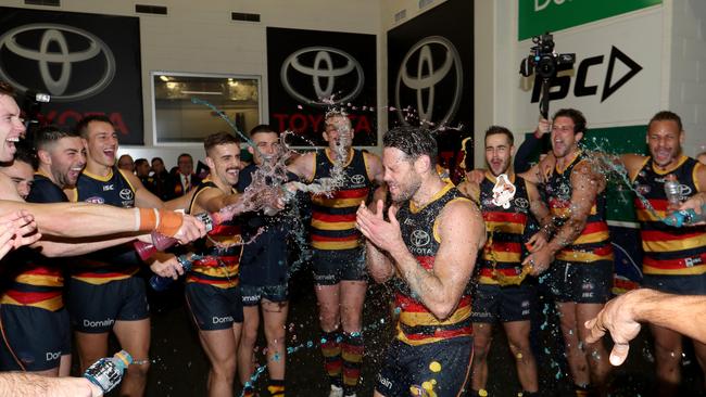 Adelaide players give Sam Gibson the Gatorade shower after his first win in Crows colours in Round 9. Picture: James Elsby/AFL Media/Getty Images