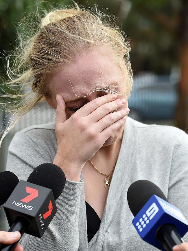 Sarah Smith breaks down at the scene of the tragic crash. Picture: Steve Tanner