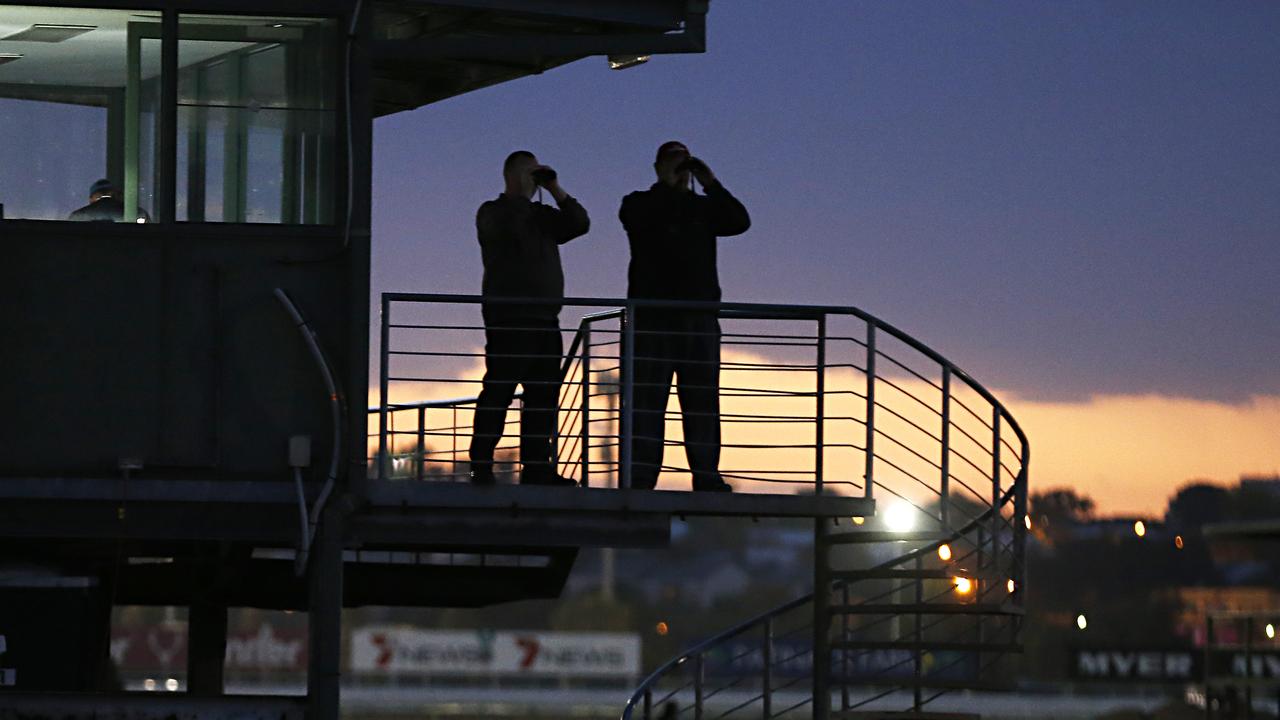 Wayne Hawkes (left) and Mike Moroney (right) spent thousands of hours over more than 25 years overseeing their respective teams at Flemington trackwork.