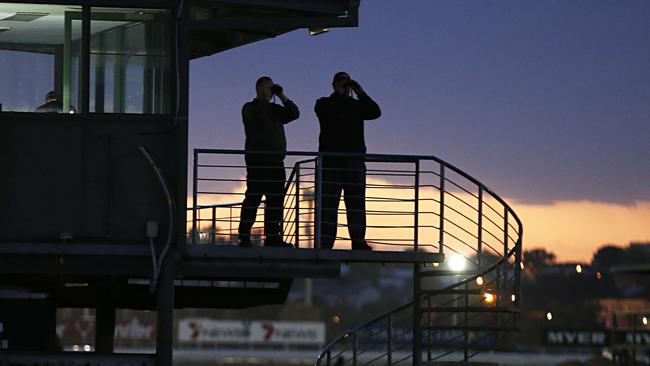 Wayne Hawkes (left) and Mike Moroney (right) spent thousands of hours over more than 25 years overseeing their respective teams at Flemington trackwork.