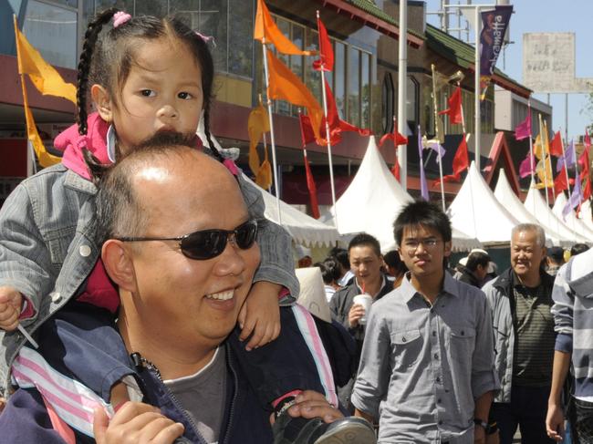 Ken Hend with daughter with daughter Alexis Yeung, 3, at the Cabramatta Moon Festival.