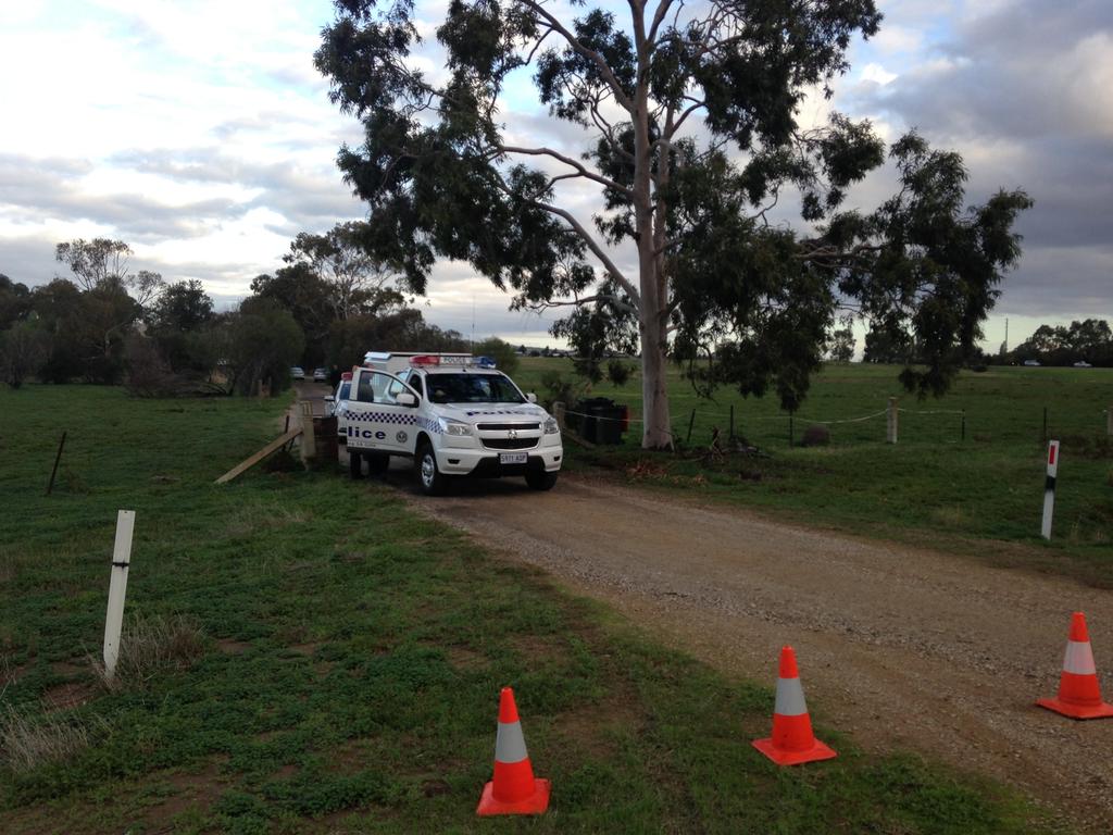 Police at the house in Hillier, in Adelaide’s north, on the day the three bodies were found. Picture: Sam Wundke