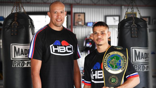 Beerwah boxer Dana Coolwell (right) pictured with coach Stephan Pitt after winning the Australian Super-Featherweight title. Photo: Patrick Woods.