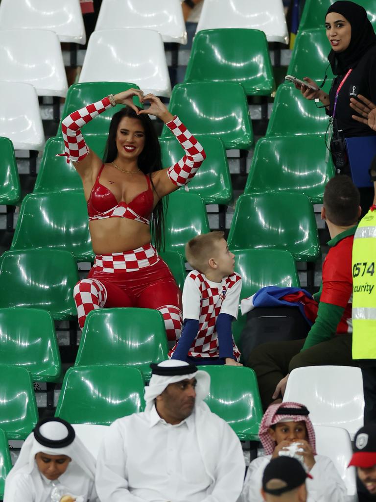 Ivana Knoll, former Miss Croatia, poses for a photo prior to Croatia-Brazil at Education City Stadium. Photo by Lars Baron/Getty Images.