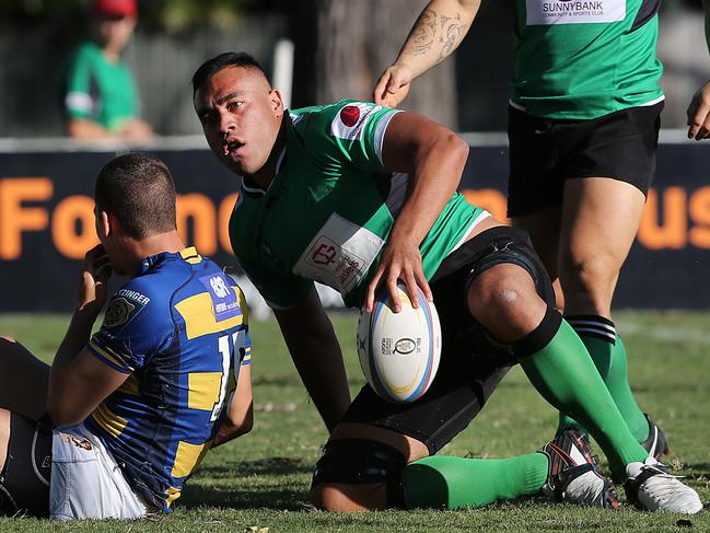 SM_Former Broncos player Caleb Timu playing for Sunnybank(green) in todays win against EAST 24-15. Pictures: Jack Tran