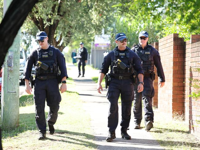 Riot Squad Police searching the scene the day after the stabbing. Picture: Tim Hunter.