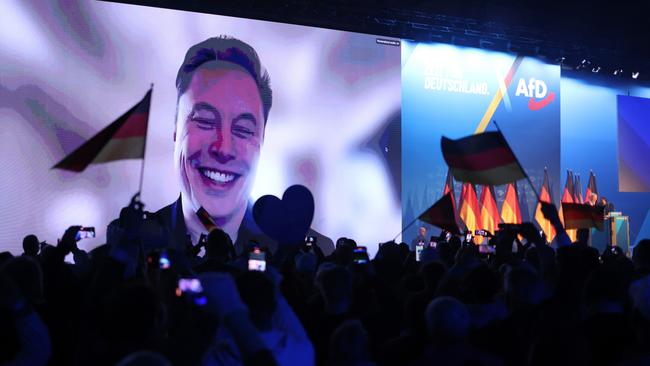 Tech billionaire Elon Musk speaks live via a video transmission during a speech by Alice Weidel, chancellor candidate of the far-right Alternative for Germany (AfD) political party, at the AfD election campaign launch rally on January 25, 2025 in Halle, Germany. Photo: Sean Gallup/Getty Images