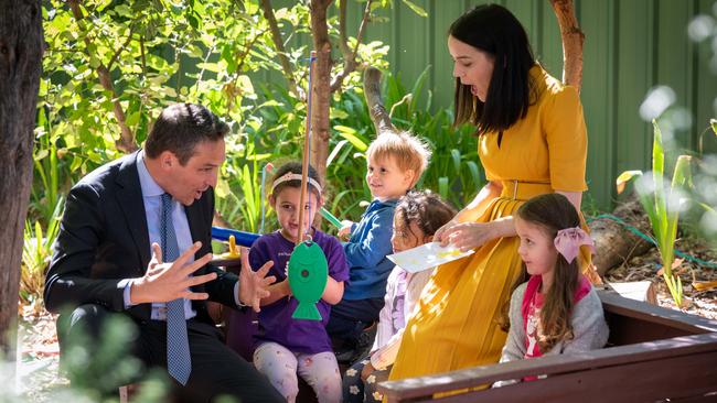 Education Minister Blair Boyer and Newland MP Olivia Savvas at Fairview Park Kindergarten with Aria, Eli, Ayla and Charlotte. Picture: NCA NewsWire / Naomi Jellicoe