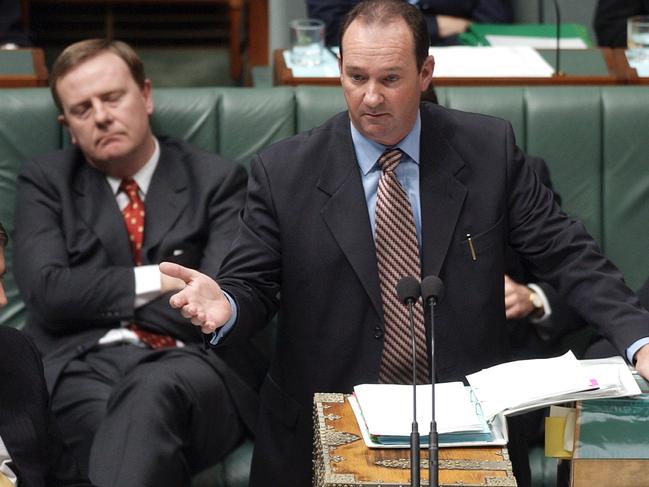 Canberra, August 14, 2003. Trade Minister Mark Vaile (centre) during Question time in the House of Representatives chamber at Parliament House in Canberra today. (AAP Image/Alan Porritt) NO ARCHIVING