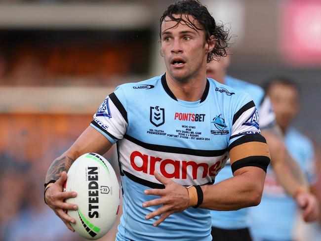 SYDNEY, AUSTRALIA - MARCH 31: Nicho Hynes of the Sharks runs the ball during the round four NRL match between Cronulla Sharks and Canberra Raiders at PointsBet Stadium, on March 31, 2024, in Sydney, Australia. (Photo by Cameron Spencer/Getty Images)