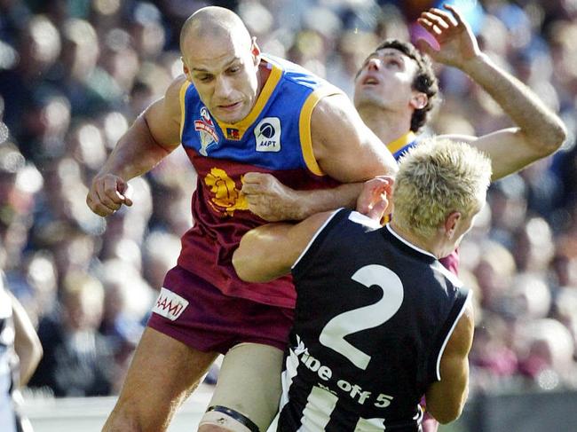 Pike lays a big bump on Shane Woewodin in the 2003 Grand Final.