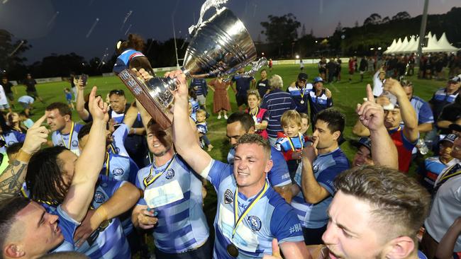 Gold Coast District Rugby Union grand final between Griffith University Colleges and Helensvale Hogs. Photo of victory celebrations. Photo by Richard Gosling