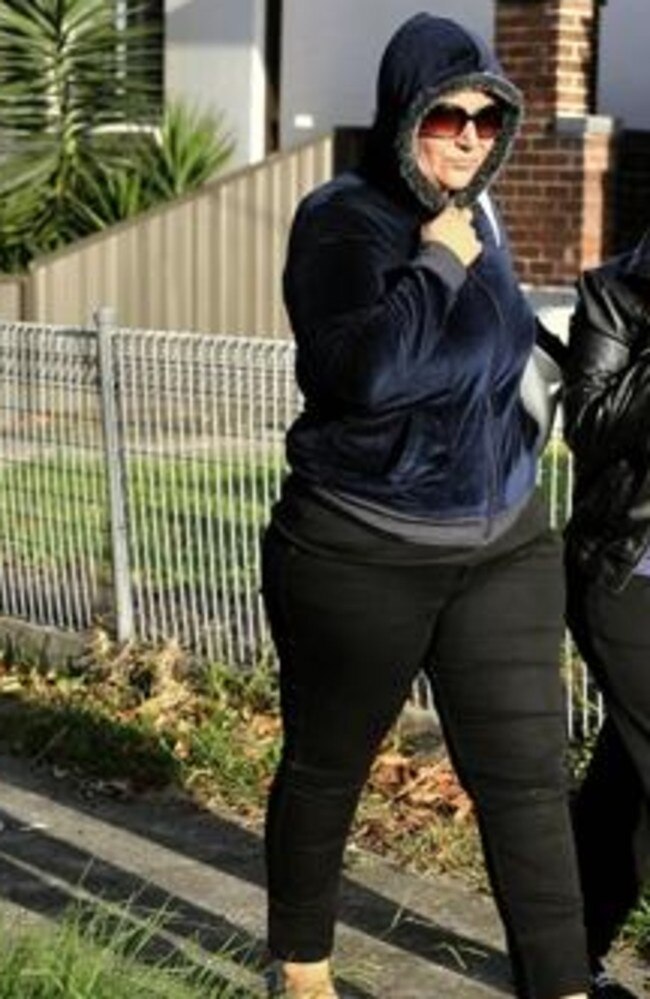 Amirah Droudis walking near her home in late 2014 after her lover had died in the Lindt cafe siege and she was on basil for murdering his ex wife. Picture: News Corp.