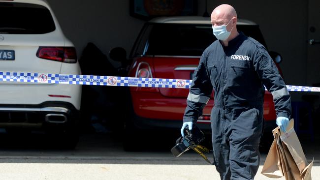 Forensic police remove evidence from a property in Point Cook after a body was found in Buckley. Picture: NCA NewsWire / Andrew Henshaw