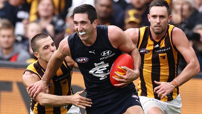 Weitering clears the ball for the Blues late in the last quarter. Picture: Michael Klein