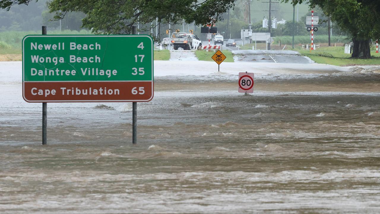 Mossman River swells beyond its limits, breaching the banks at Foxton Bridge. Picture: Liam Kidston