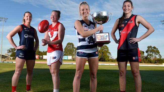 July 31st 2020 - The SANFLW finals start next weekend and the final four are locked in with Norwood, North Adelaide, South Adelaide and West Adelaide preparing to contest the major round. Captains (L-R) Ali Ferrall (Norwood), Leah Tynan (North), Sam Pratt (South) and Lauren Gee (West) at Thebarton Oval . Picture: Naomi Jellicoe