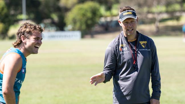 Sam Mitchell has a laugh with Nick Watson. Picture: Brad Fleet