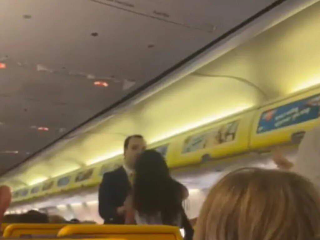 Passengers applaud as the woman left the plane in a huff. Picture: Twitter