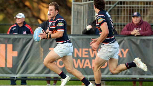 Jack Bowen makes a break for Easts in the Shute Shield last year.