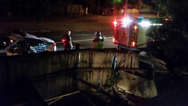 A car collided with a fence at Varsity Lakes on the Gold Coast last night. Picture: Rebecca Mann