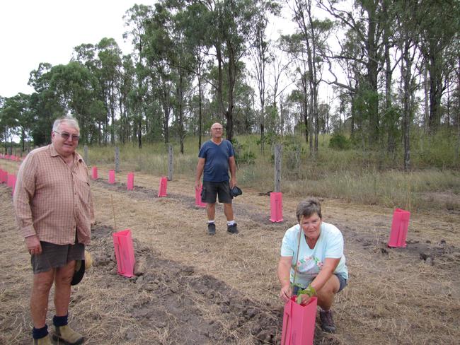 Lowood Beautification Project coordinator Peter Bevan with volunteers John and Sue Cook.