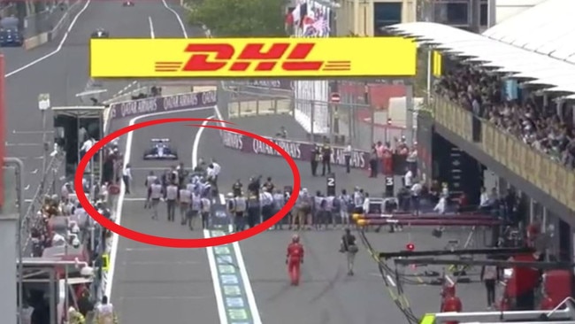 car almost hits crowd at F1 race