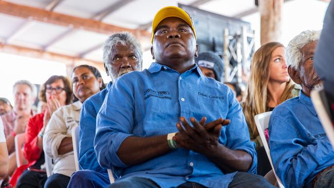 Indigenous people look on during a keynote speech by Australian Prime Minister Anthony Albanese during the Garma Festival. Picture: Tamati Smith/ Getty Images