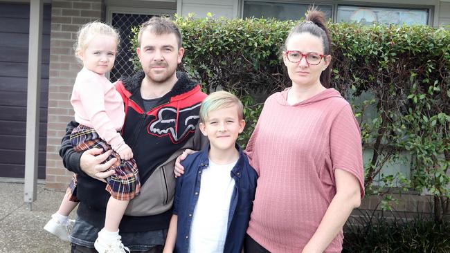 Tara Ferguson, Brodie Lehner and Cameron Leworthy 9 and Kayliegh Lehner had nowhere to live after the collapse of Pivotal Homes. Picture: Richard Gosling