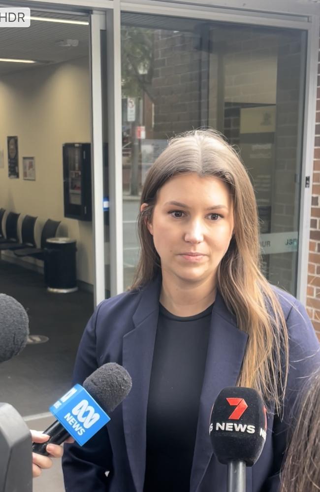 One of the former housemates speaks to reporters outside Waverley local court. Picture: Madeleine Damo/The Daily Telegraph