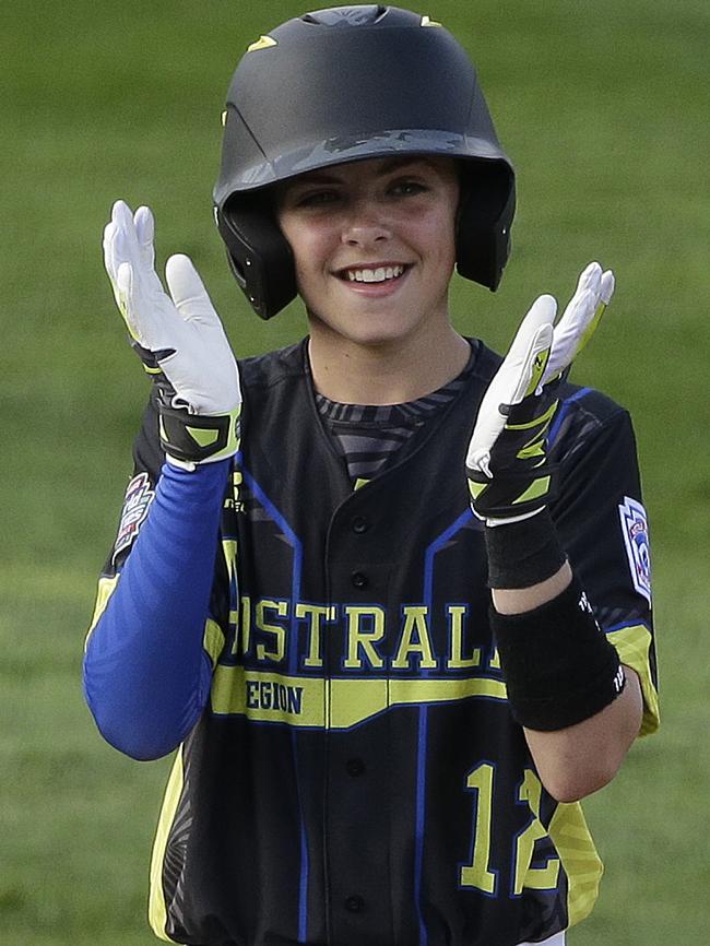 Australia's Ryley Gonzalez stands on second base after driving in a run with a double. Picture; AP